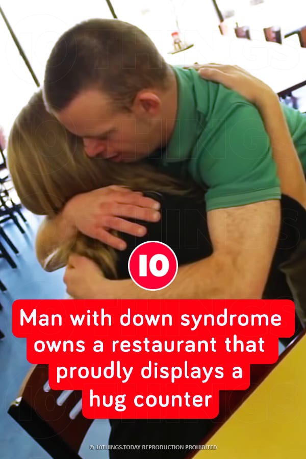 Man with down syndrome owns a restaurant that proudly displays a hug counter