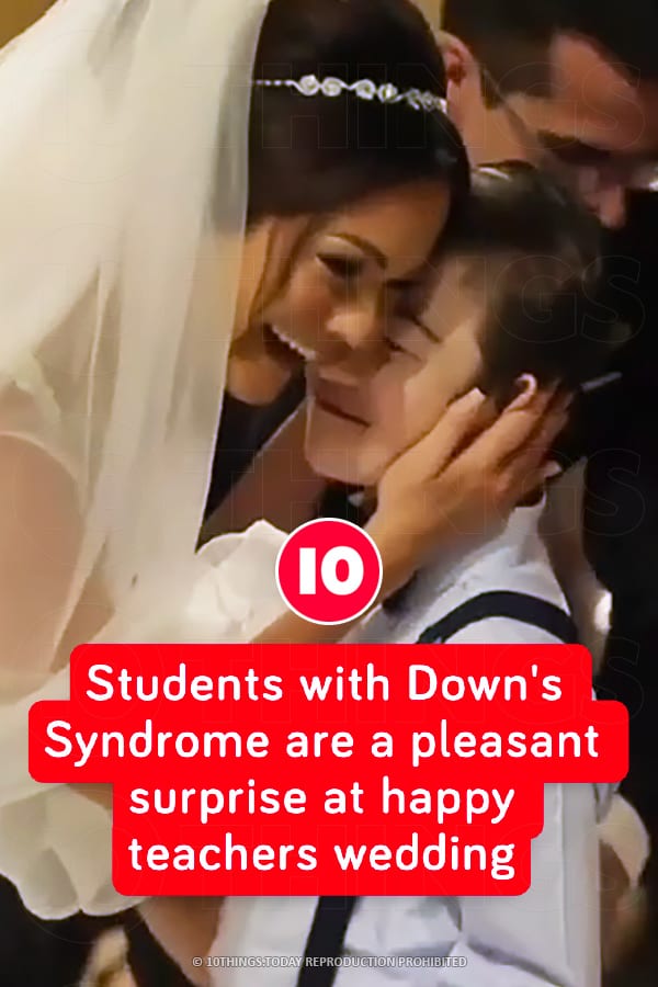 Students with Down\'s Syndrome are a pleasant surprise at happy teachers wedding